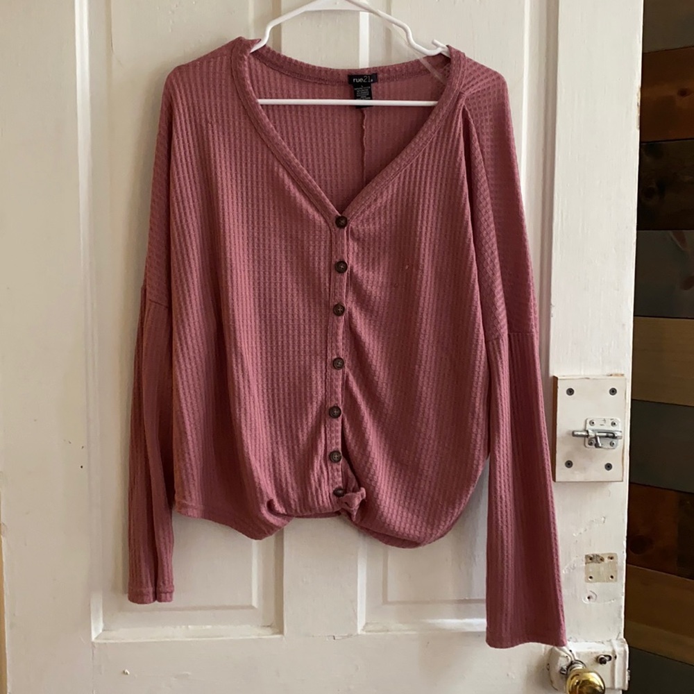 Long sleeve pink button up sweater.  Size L